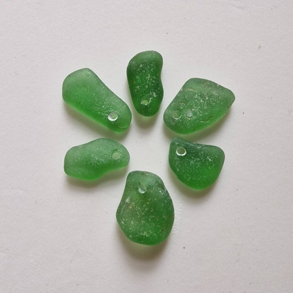 Genuine Seaham sea glass pieces in shades of  green. Top drilled. Small. Ideal charms/pendants/crafts/jewellery. Naturally surf tumbled