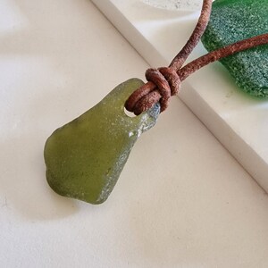 Genuine English seaham  Sea Glass pendant necklace, on real leather cord, in a green. Naturally surf tumbled. Adjustable