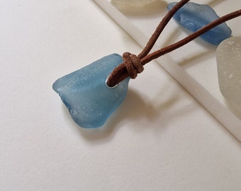 Genuine English Sea Glass pendant necklace, on real leather cord, in cornflower blue. Beach glass. Adjustable. Naturally surf tumbled