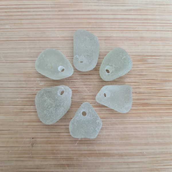 Genuine Seaham English sea glass pieces in shades of pale sea foam green. Top drilled. Ideal pendants/crafts. Naturally surf tumbled. Small