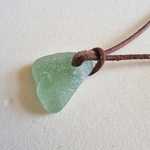 Genuine English seaham  Sea Glass pendant necklace, on real leather cord, in solid sea foam green.  Naturally surf tumbled. Beach glass.
