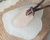 Genuine English Sea Glass pendant necklace, on real leather cord, in rare peach pink. Beach glass. Small. Naturally surf tumbled.