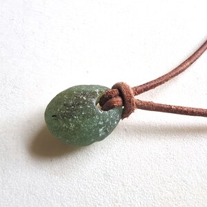 Genuine English seaham  Sea Glass pendant necklace, on real leather cord, in unusual green. Naturally surf tumbled. Beach glass.