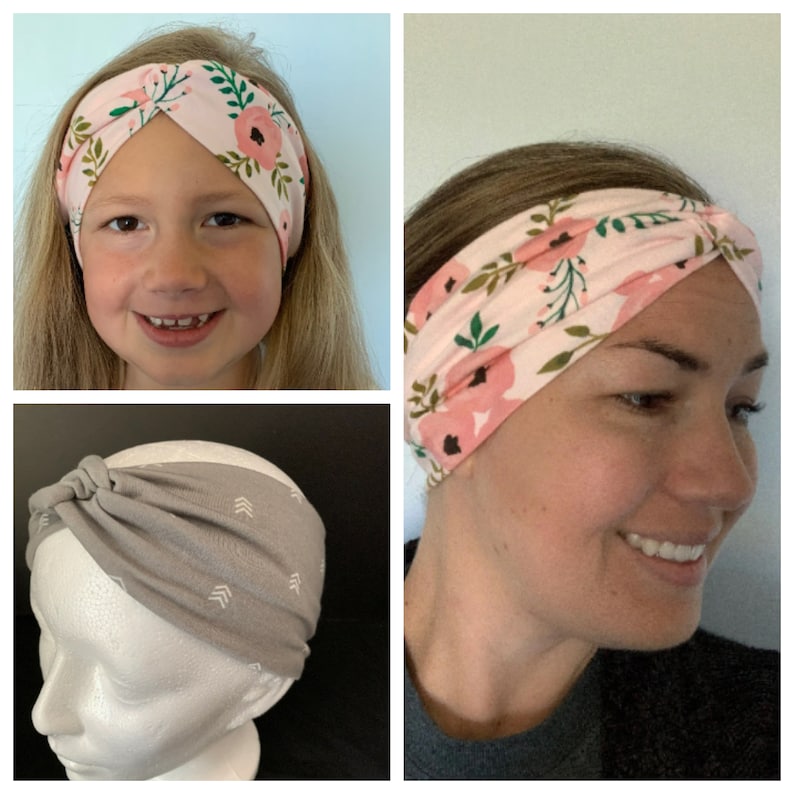 May include: Two women wearing different patterned headbands. One headband is pink with floral designs, the other is gray with white arrows. Both headbands are made of soft, stretchy fabric and are designed to be worn as a turban.