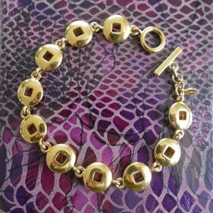 Vintage Monet Gold Tone Link Bracelet Toggle Clasp Geometric Disc Design