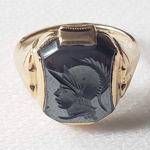 Roman soldier head shop ring meaning