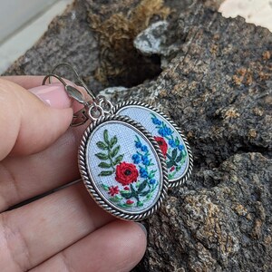 Hand Embroidered Oval Earrings with Red and Blue Flowers – Silver Frame – Folk-Inspired, Herbs Jewelry, Wildflower Handmade Earrings