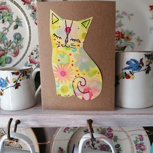 Tres tarjetas de felicitación pintadas a mano con un lindo gatito