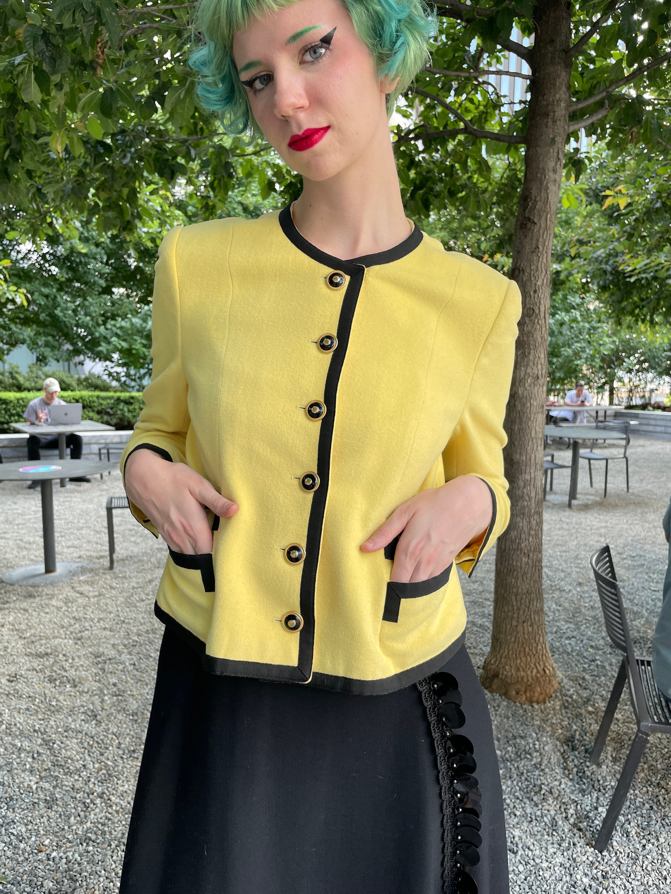 90s Louis Feraud jacket. classic jacket made in a striking yellow wool with  black grosgrain ribbon along the neckline, sleeves, and pockets