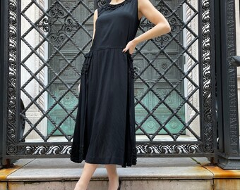 20's black silk dress w/ 2 panels and 6 ribbons on the bottom, scoop neck , ribbons,