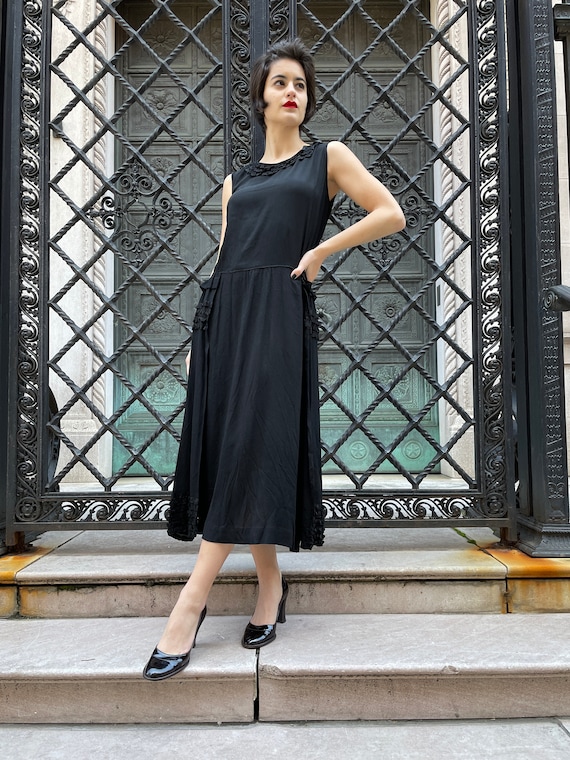 20's black silk dress w/ 2 panels and 6 ribbons on