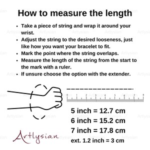 May include: Diagram illustrating how to measure wrist size for bracelets. Includes instructions, a hand outline, and a ruler with measurements in inches and centimeters. Text reads: 5 inch = 12.7 cm, 6 inch = 15.2 cm, 7 inch = 17.8 cm, ext. 1.2 inch = 3 cm.