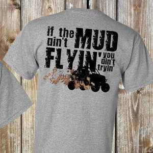 May include: Two gray t-shirts with a black graphic print of an off-road vehicle and the text "If the mud ain't flyin' you ain't tryin'"