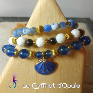 Triple bracelet in round beads of tourmaline, agate, tridacna and rosewood
