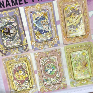 May include: A collection of six decorative enamel pins featuring various cartoon characters. Each pin is set on a decorative card with the text "SUMMERROSE" and character names. The pins have gold, purple, pink, and green accents.