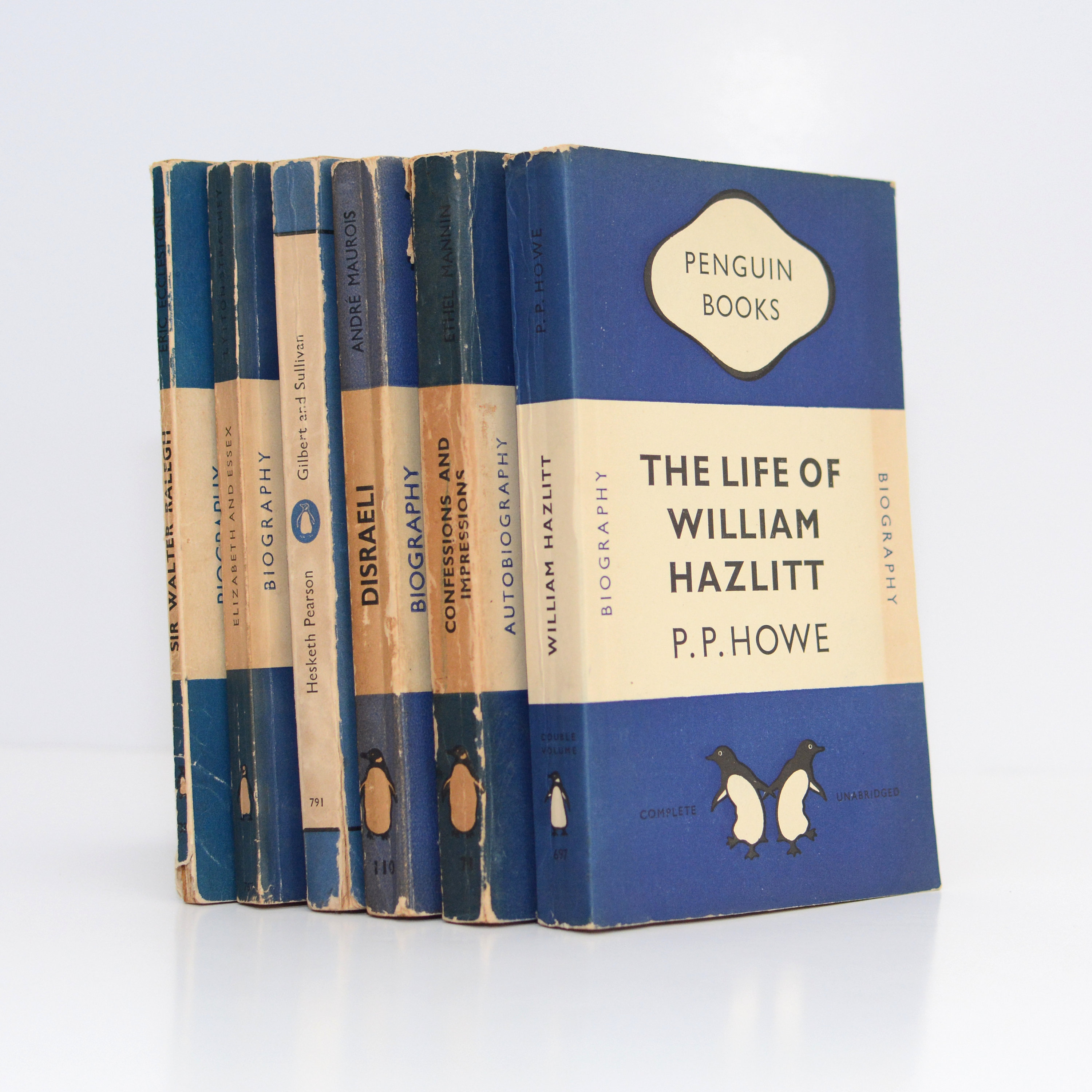 Four Book Collection of Dark Blue Vintage Penguins (biography