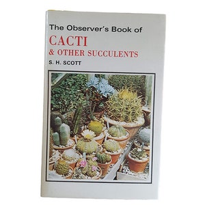 May include: The Observer's Book of Cacti & Other Succulents by S.H. Scott. A book cover featuring a variety of cacti and succulents in terracotta pots.
