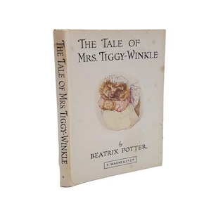 May include: The Tale of Mrs. Tiggy-Winkle by Beatrix Potter, a vintage children's book with a white cover and a colorful illustration of a hedgehog.