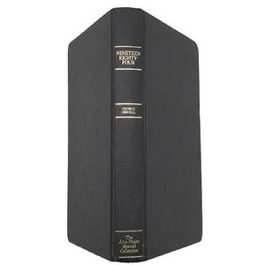 May include: A hardcover book titled "NINETEEN EIGHTY-FOUR" by George Orwell. The spine is black with gold lettering and includes "The John Player Special Collection". The book is black and appears to be in good condition.