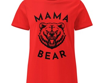 May include: A red t-shirt with the words "MAMA BEAR" in bold black letters above and below a detailed black bear illustration. The bear is depicted with an open mouth and snarling expression.