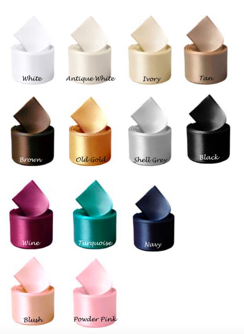 May include: A collection of 14 spools of satin ribbon in various colors, including white, antique white, ivory, tan, brown, old gold, shell grey, black, wine, turquoise, navy, blush, and powder pink.