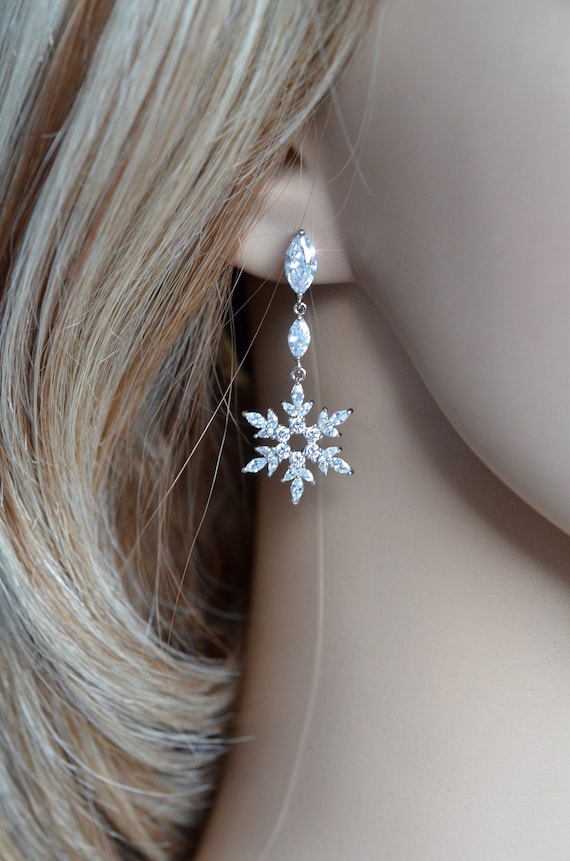 Snowflake dangle earrings deals