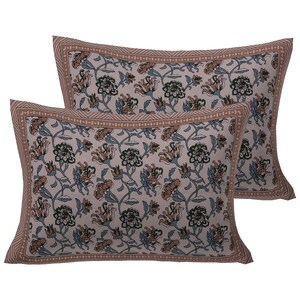 May include: Two pillowcases featuring a floral design in shades of brown, pink, and green. The pillowcases have a brown border with a geometric pattern.
