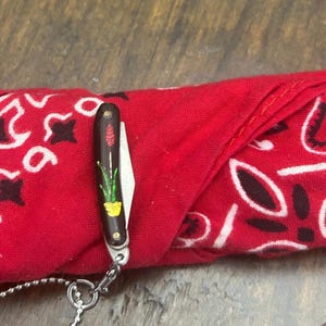Vintage 1970’s miniature working pocket knife with flower pendant necklace