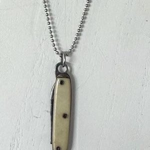 Vintage Mother Of Pearl miniature working pocket knife pendant necklace with original advertisement