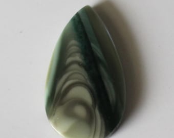May include: A teardrop-shaped green and white agate cabochon with swirling patterns.