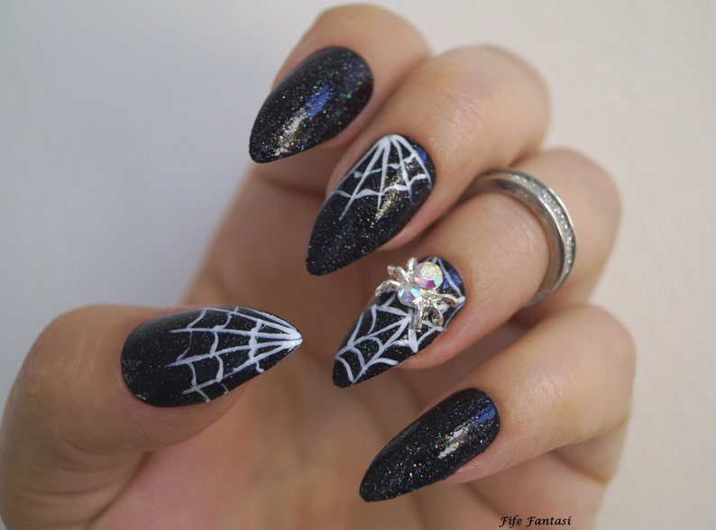 5. Ghostly Stiletto Nails - wide 6