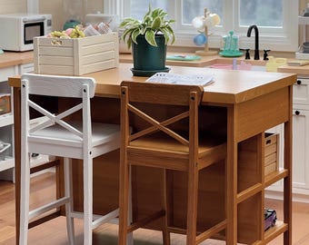 May include: A wooden kitchen island with two chairs. The island has a shelf and a drawer. The chairs are white and brown. There is a plant in a green pot on the counter.