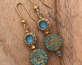 Hanging earrings in sea green