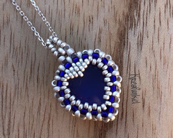 Necklace with threaded heart