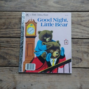 May include: A vintage children's book titled "Good Night, Little Bear" with a colourful illustration of two bears on the cover. The book is a Little Golden Book.