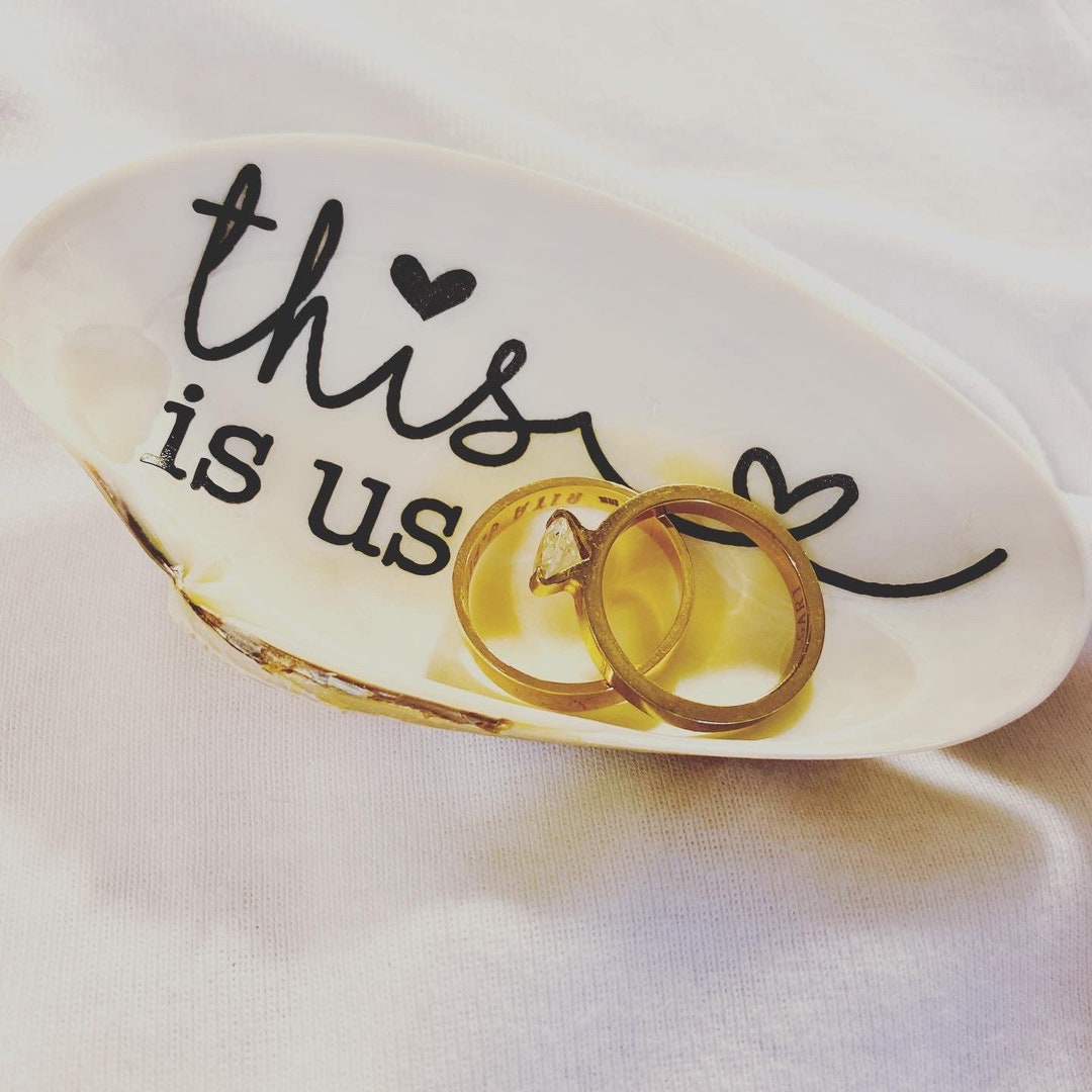 Questo è un porta-anello a forma di conchiglia, porta-anello a