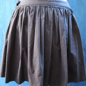 Wyeth Black Cotton Pleated Mini Skirt with Black Floral Embroidery