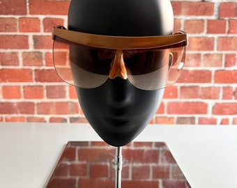 Rare and collectible vintage 1970’s Courrèges gold shield sunglasses