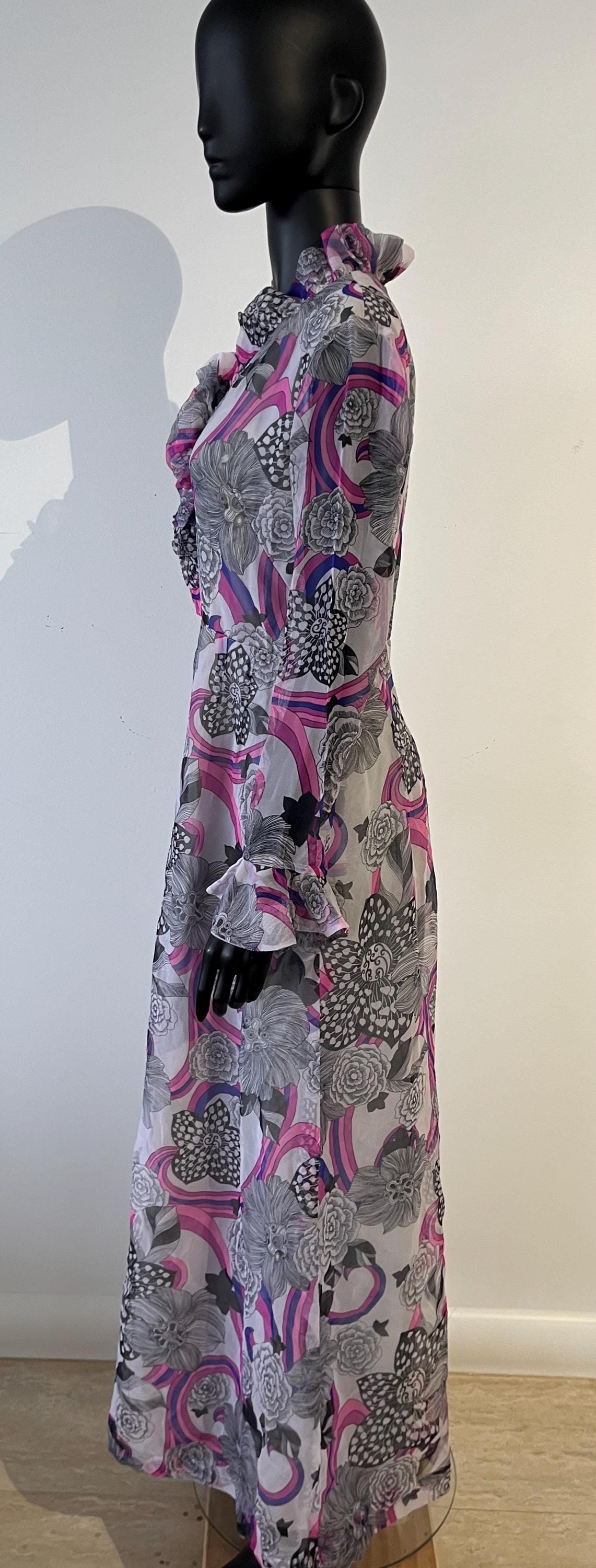 A spectacular vintage 1970's patterned long evening dress
