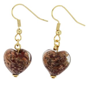 May include: A pair of gold-colored heart-shaped earrings. Each earring features a heart-shaped bead with a brown and gold swirl design. The earrings have a gold-colored hook and decorative accents.