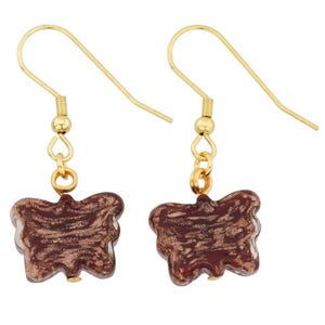 May include: Gold butterfly earrings with a brown and gold swirl pattern.