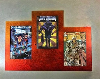 Multi-3 Graded Comic Book Frame. (*last one available) 3 graded comic book cases in one frame. Fits slab up to 8 1/2” x 14” x 5/8” max.
