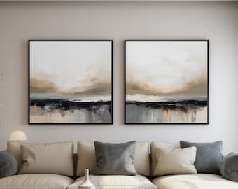 May include: Two framed abstract landscape paintings in neutral tones of beige, brown, and gray hang above a beige sectional sofa with gray and beige pillows. A wooden coffee table with a vase and tea set sits in front of the sofa.