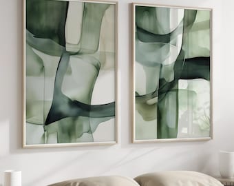 May include: Two framed abstract art prints with a green and white color scheme. The prints feature overlapping shapes and lines in a watercolor style.