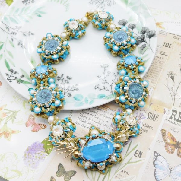 Soutache necklace created entirely by hand in marine shades with the use of high quality crystals