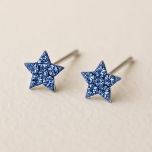 Kleine sterlingzilveren blauwe fonkelende steroorknopjes