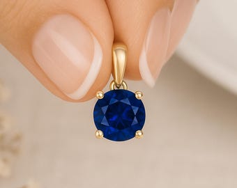 Dainty Sapphire Drop Pendant: 9ct Yellow Gold September Birthstone