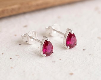 Pear Cut Ruby Stud Earrings in Sterling Silver