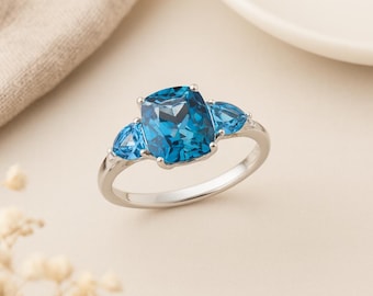 9ct White Gold London Blue Topaz Ring – Cushion Cut Three Stone Engagement Ring
