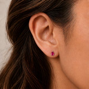 Pear Cut Ruby Stud Earrings in Sterling Silver
